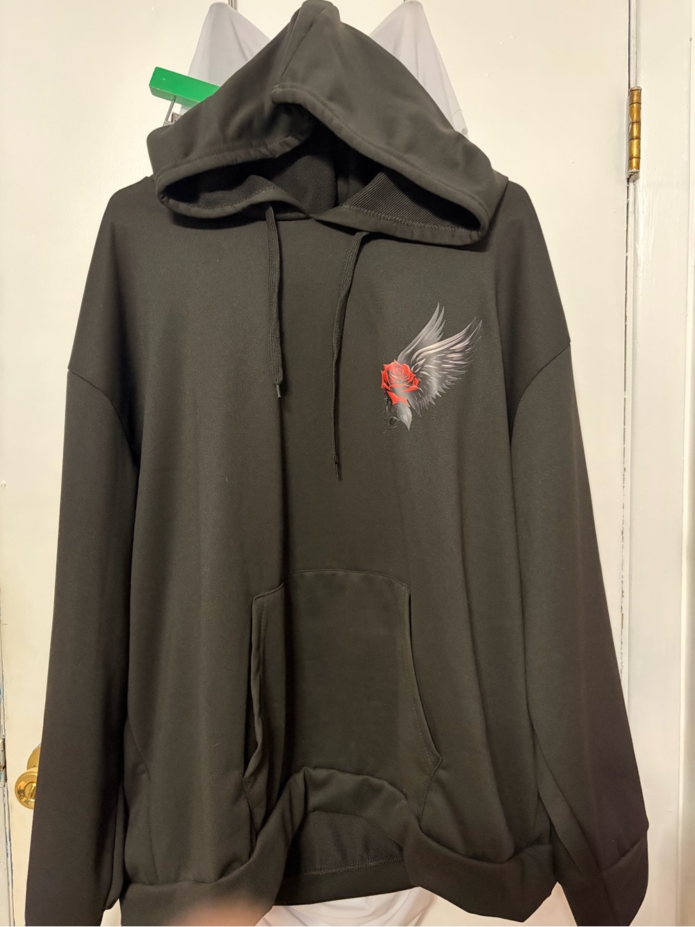 Women’s Black Hoodie with Winged Rose Graphic